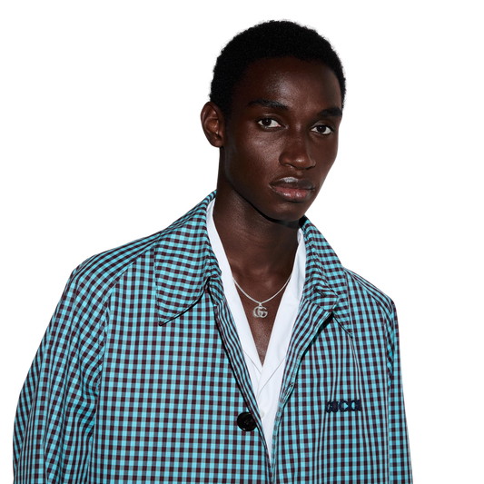 Discover understated luxury with this authentic Gucci GG pendant necklace. Crafted in polished sterling silver, its minimalist design makes it the perfect statement accessory for layering or wearing solo.
