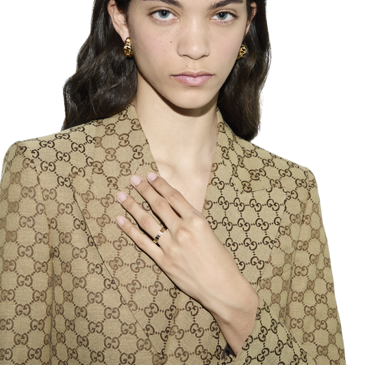 This size 16 Gucci Icon Ring brings timeless style to any jewellery collection. Its polished 18ct yellow gold band is beautifully detailed with the iconic GG motif.