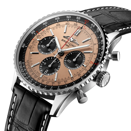 side view of Breitling Navitimer chronograph showing steel case pushers crown and slide rule bezel