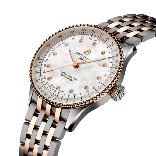 side view of Breitling Navitimer Automatic showing steel and rose gold case crown and beaded bezel detail