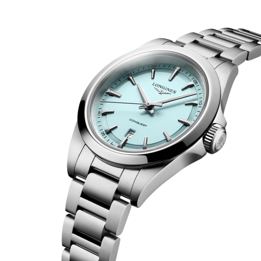 Sporty yet elegant, the Longines Conquest features a mint blue dial and polished stainless steel bracelet for effortless everyday style.
