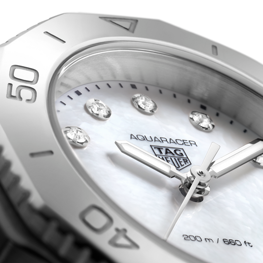 full view of the TAG Heuer Aquaracer highlighting the refined steel bracelet and balanced, sporty case design