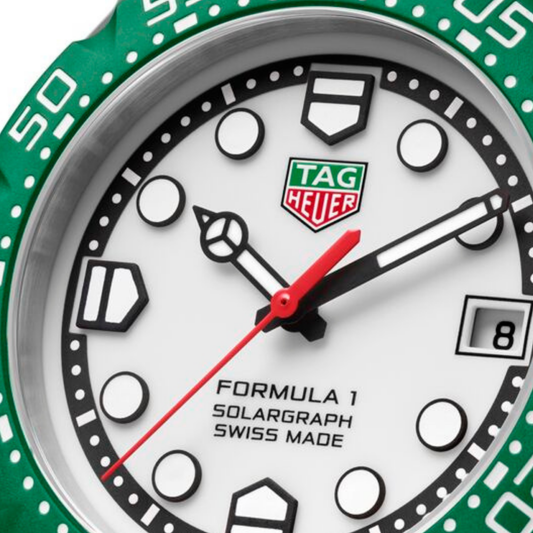 close-up of the crisp white dial highlighting the high-contrast markers, black minute track, and vibrant red seconds hand for clear, sporty readability