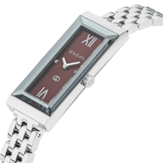 side profile of the Gucci watch highlighting the slim rectangular case, polished stainless steel bracelet links, and elegant jewellery-inspired silhouette