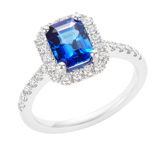 Emerald Cut Blue Sapphire and Diamond Cluster Ring in Platinum On A Transparent Background