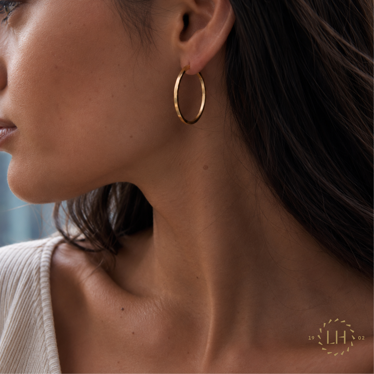 Hoop Earrings in 18ct Yellow Gold On a Modal with Brown Hair 