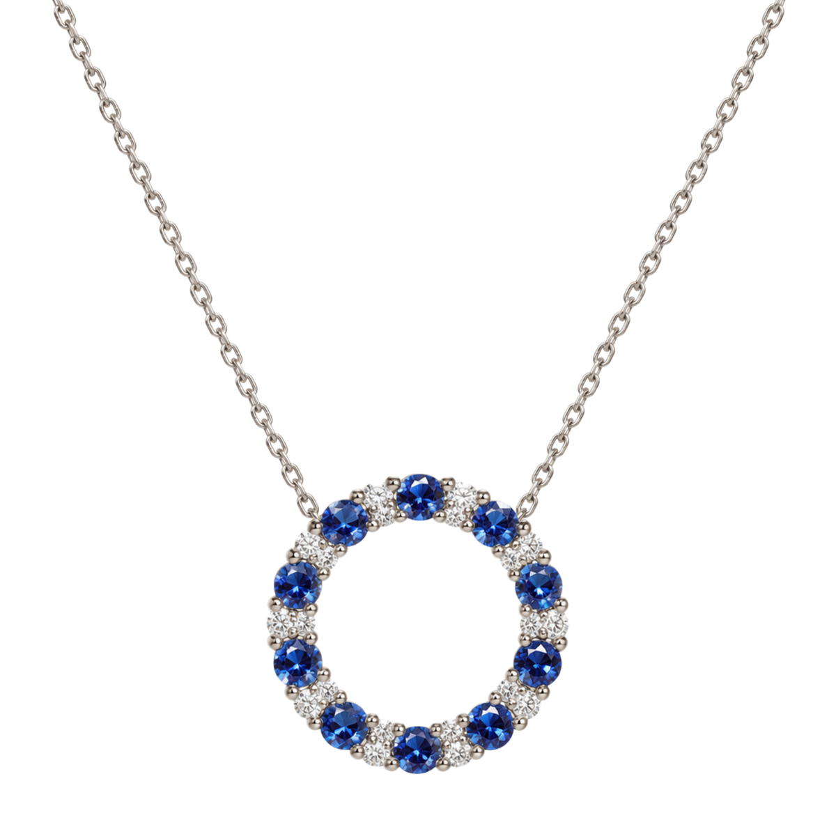 18ct white gold sapphire and diamond circle pendant necklace featuring alternating blue sapphires and brilliant cut diamonds in a large circular design