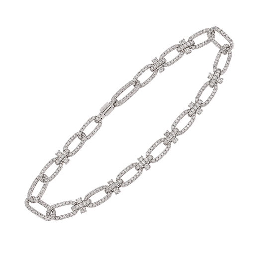18ct white gold diamond link bracelet with polished interlocking links and brilliant-cut diamond detailing.