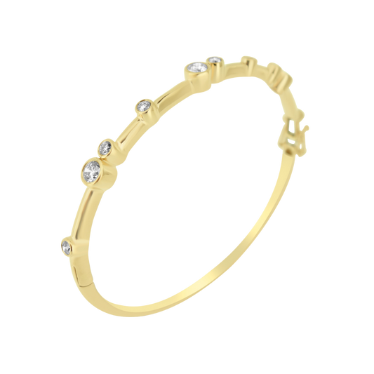 18ct yellow gold bubble bangle with ten round brilliant-cut diamonds in rub-over setting, total 0.99ct.