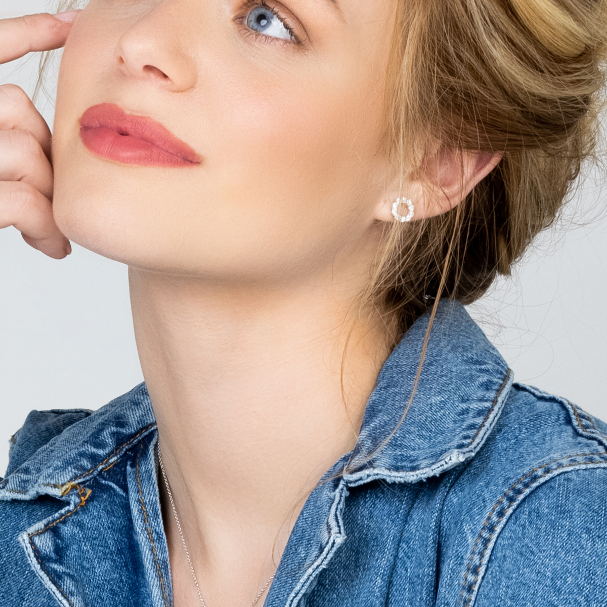 Small Brilliant Cut Diamond Earrings in 18ct White Gold on Modal in Denim 