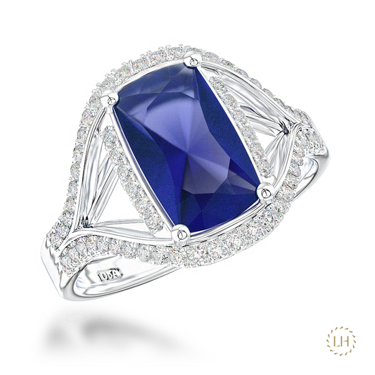 Platinum Sapphire & Diamond Cluster Ring, featuring a 2.23ct cushion-cut sapphire surrounded by 0.33ct of round brilliant-cut diamonds.