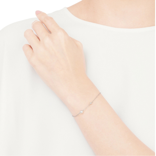 Mikimoto 5mm Grade A Akoya Cultured Pearl and Diamond Chain Bracelet in 18ct White Gold on a model 