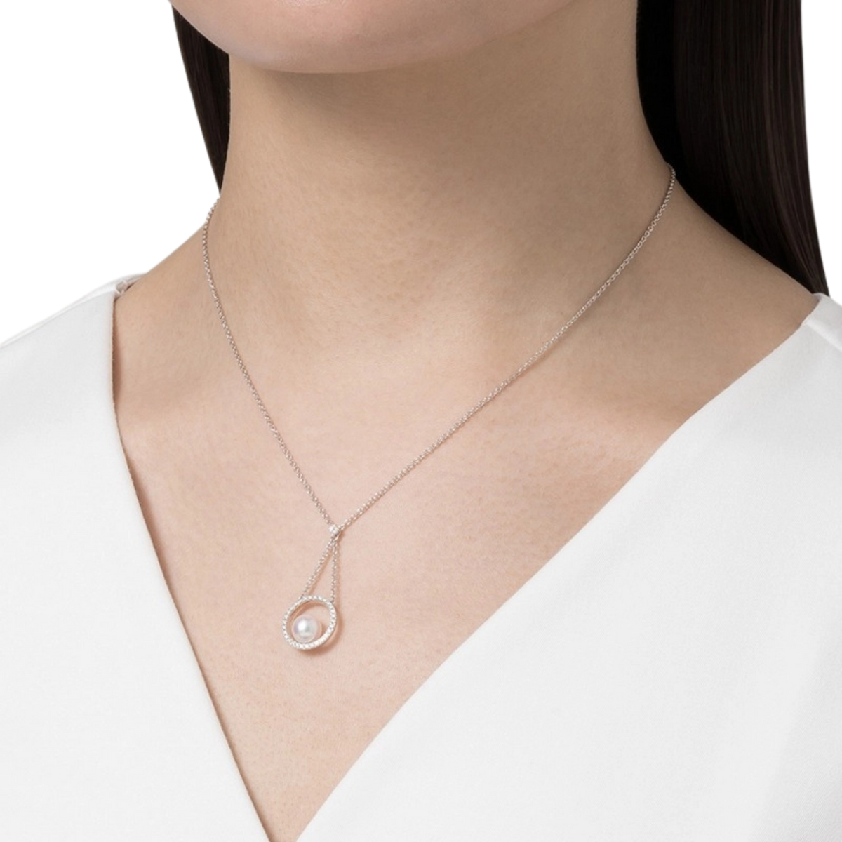 A model wearing Mikimoto Circle Collection 7mm Akoya Cultured Pearl and Diamond Pendant in 18ct White Gold