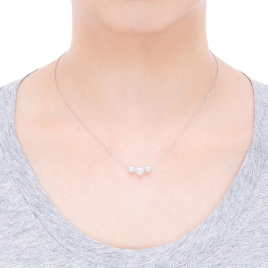 Completed by an approximately 18-inch 18ct white gold chain, this sophisticated pendant combines timeless Akoya pearls with contemporary styling. Its versatile design makes it an elegant choice for both everyday wear and special occasions.