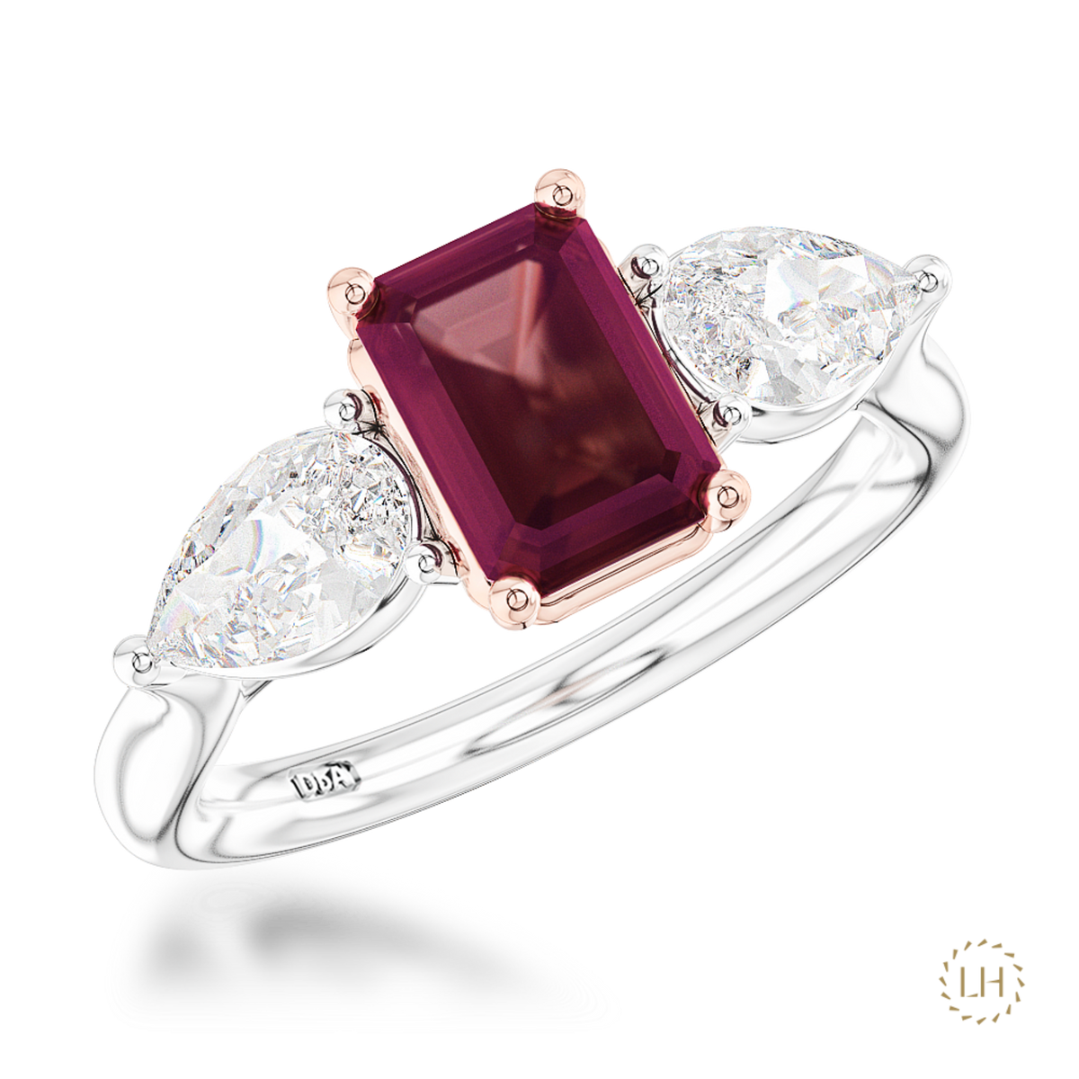 Platinum Emerald Cut Diamond Three Stone Ring, featuring a 1.51ct emerald-cut centre diamond complemented by two pear-shaped diamonds totalling 0.80ct.