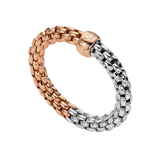 A graceful blend of 18ct white and rose gold gives this small FOPE Essentials ring a distinctive two-tone finish, enhanced by the collection's flexible Flex'it design.