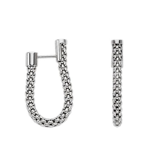 The FOPE Flex’it Essential Small Hoop Earrings are a contemporary expression of Italian luxury, crafted in 18ct white gold with the brand’s signature flexible mesh design.