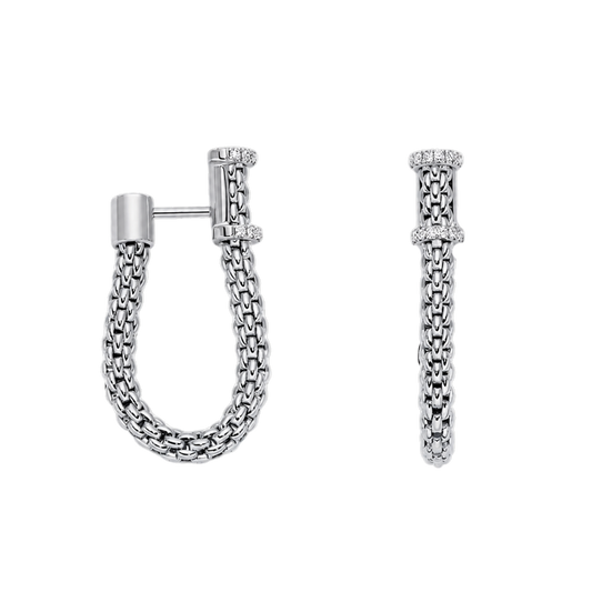 The FOPE Flex’it Essential Small Hoop Earrings are a contemporary expression of Italian luxury, crafted in 18ct white gold with the brand’s signature flexible mesh design.