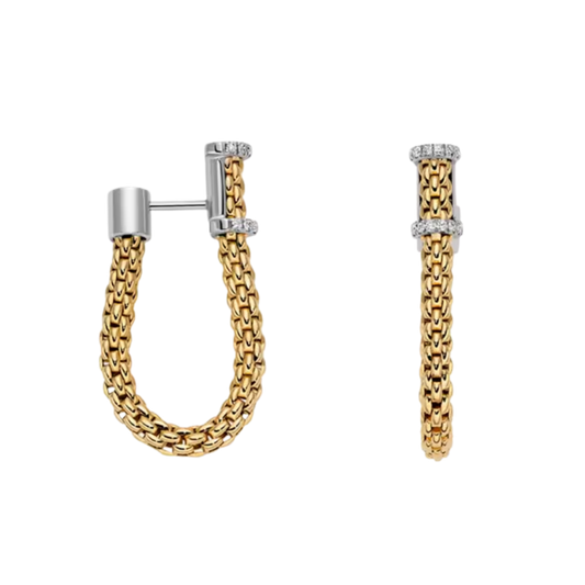 The FOPE Eka Flex’it Diamond Hoop Earrings are a striking example of modern Italian luxury, crafted in 18ct yellow gold with the brand’s signature flexible mesh design. 