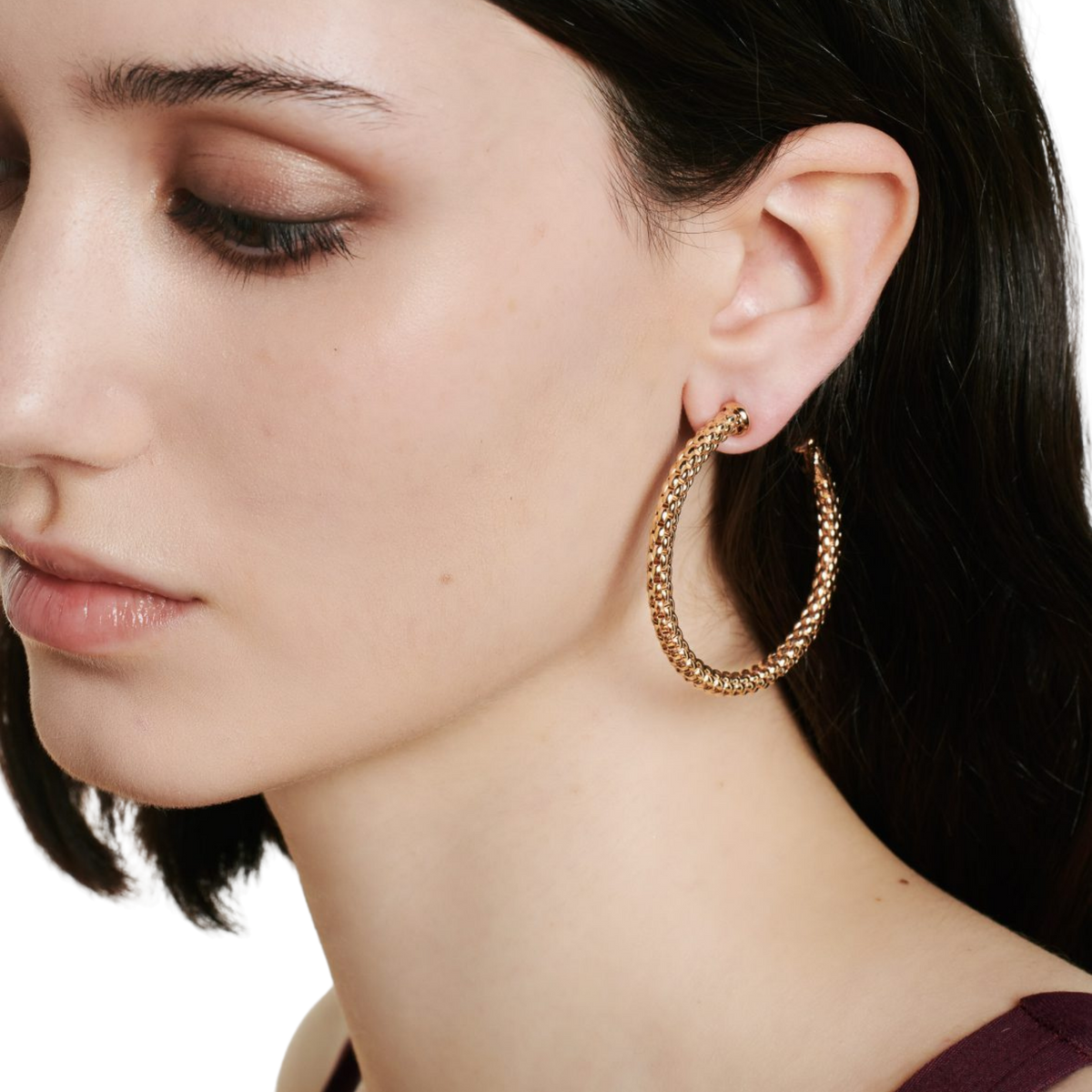 The FOPE Essentials Large Hoop Earrings are expertly crafted in 18ct rose gold, bringing together timeless style and contemporary Italian design. Their 50mm profile creates an elegant statement while remaining lightweight and comfortable for everyday wear.