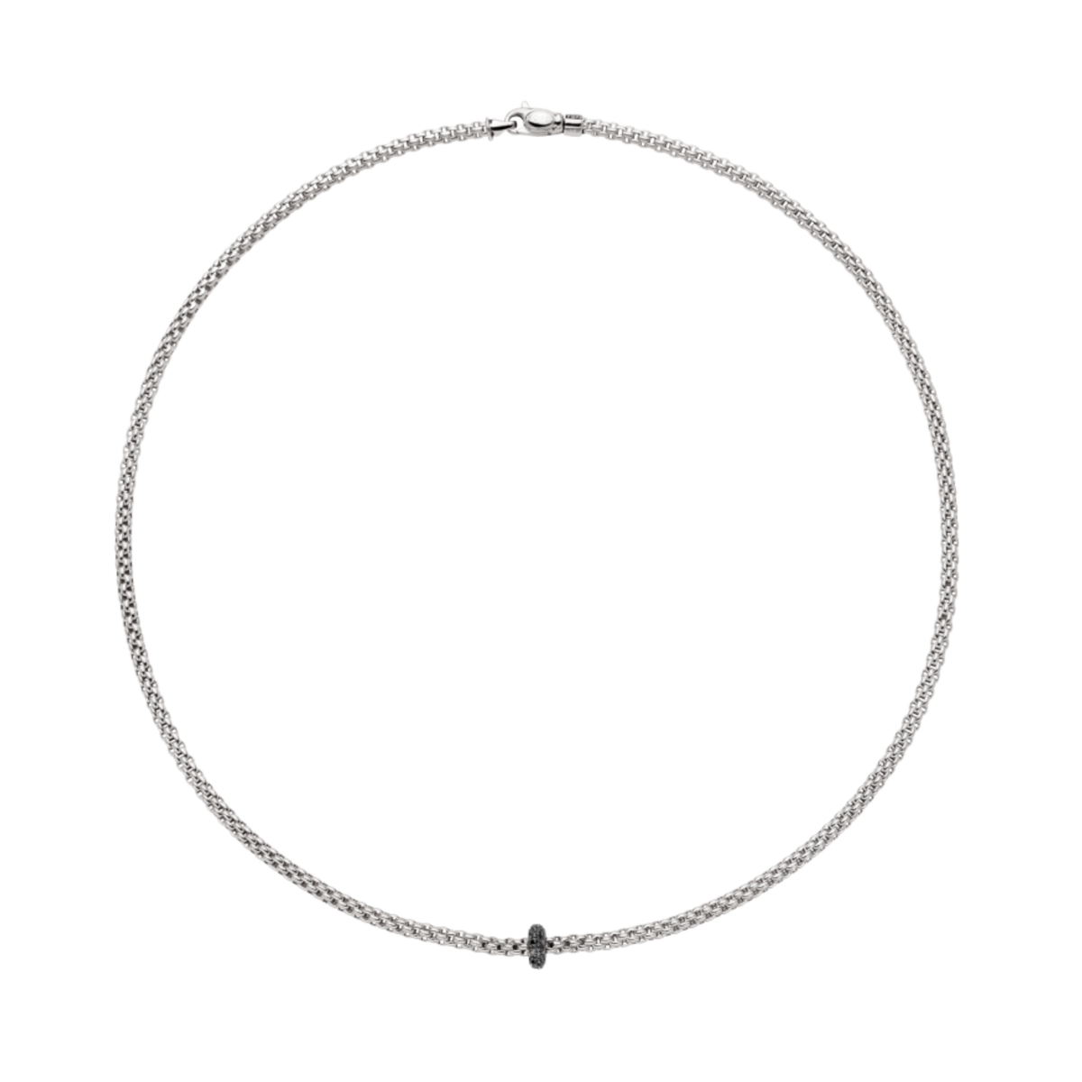 Designed in Italy, this FOPE necklace combines flexible 18ct gold craftsmanship with a striking 0.20ct black diamond detail. The minimalist design makes it effortlessly versatile, perfect for everyday elegance or elevated styling.