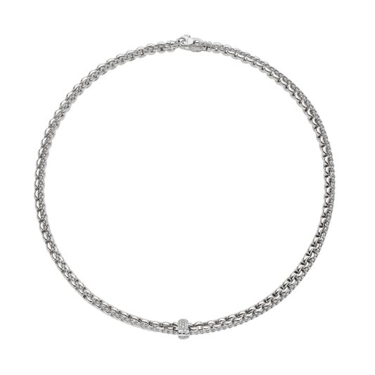 The FOPE Eka Diamond Pavé Necklace features a minimalist yet luxurious design in 18ct white gold. Set with 0.37ct of brilliant diamonds, it offers a soft shimmer that sits beautifully at the neckline in a versatile 43cm length.