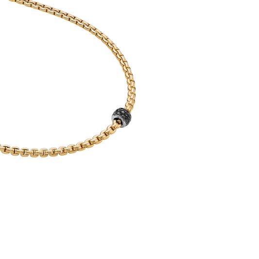 From the iconic Eka collection, this 43cm necklace combines warm yellow gold with dramatic black diamonds for a distinctive look. The signature Flex'it construction ensures a comfortable fit from morning to evening.
