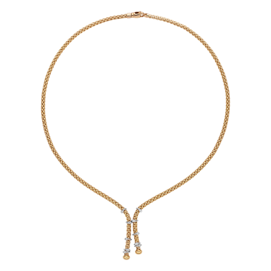 Crafted in 18ct yellow gold, this FOPE Prima Flex'it necklace features ten white gold rondels set with 0.14ct of brilliant cut diamonds. Measuring 43cm, it combines signature flexibility with elegant everyday style.