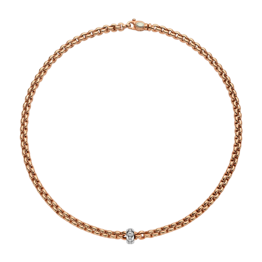 Crafted in 18ct rose gold, this FOPE Eka Flex'it necklace is accented with a white gold rondel set with 0.15ct of brilliant diamonds. Its flexible design offers exceptional comfort while bringing effortless elegance to any occasion.