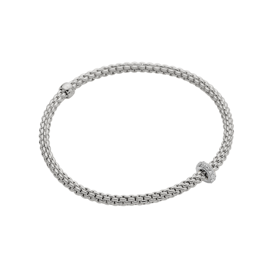A clean expression of modern luxury, this FOPE Prima bracelet in 18ct white gold is set with 0.18ct of pavé diamonds. Its flexible construction moves naturally with the wrist, giving a soft, almost weightless feel in a Medium fit.