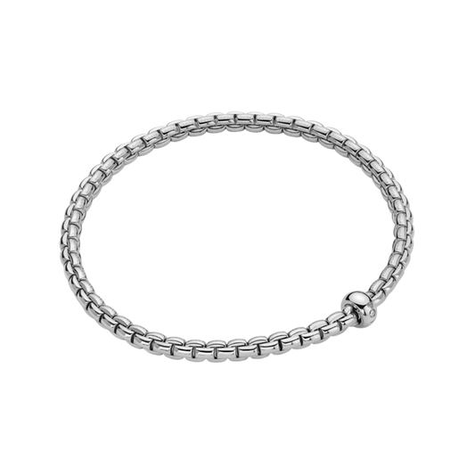 Quietly luxurious, this FOPE Eka bracelet is crafted in polished 18ct white gold and finished with a single 0.01ct diamond. The Large size offers an easy, relaxed fit that feels light on the wrist.
