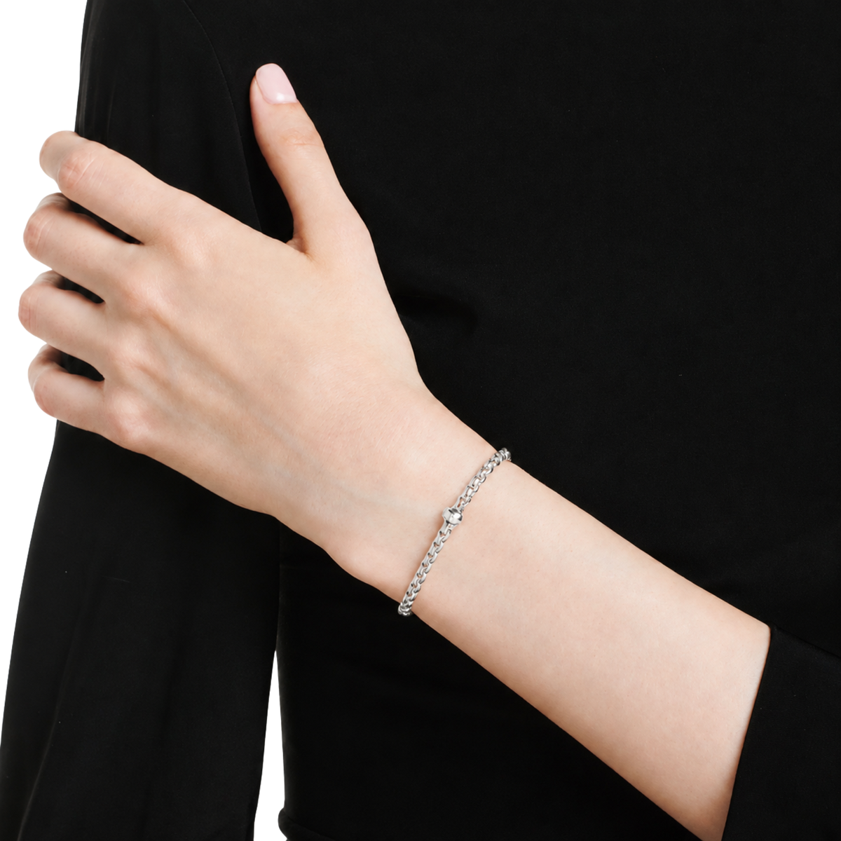 FOPE EKA bracelet in white gold featuing a 0.01ct brilliant round diamond on model.