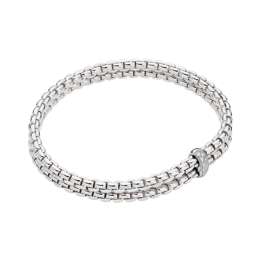 A contemporary FOPE Eka bracelet in 18ct white gold, featuring a two-row Flex'it design and a 0.10ct diamond-set rondel in a medium size.