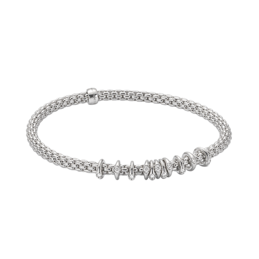 Elegant from every angle, this 18ct white gold FOPE Prima bracelet showcases multiple diamond-set rondels totalling 0.15ct on a flexible medium-sized band.