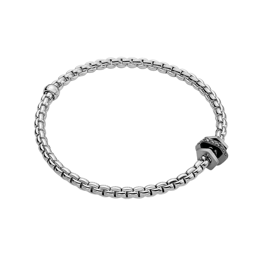 Three rows of flexible 18ct white gold give this medium FOPE Eka bracelet a bold, contemporary look, finished with a sparkling 0.14ct diamond-set detail.