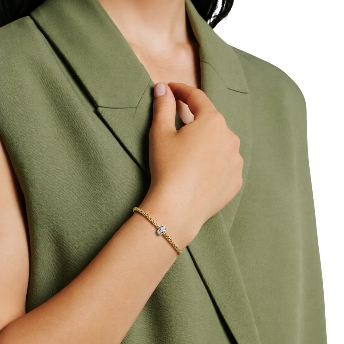 18ct yellow gold FOPE bracelet with white gold diamond rondel on model.