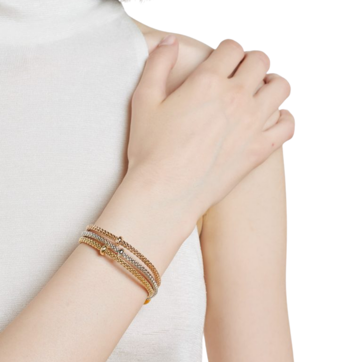 Simple, elegant and made to move with you, this medium FOPE Prima bracelet is crafted from 18ct yellow gold and finished with a single brilliant-cut 0.01ct diamond.