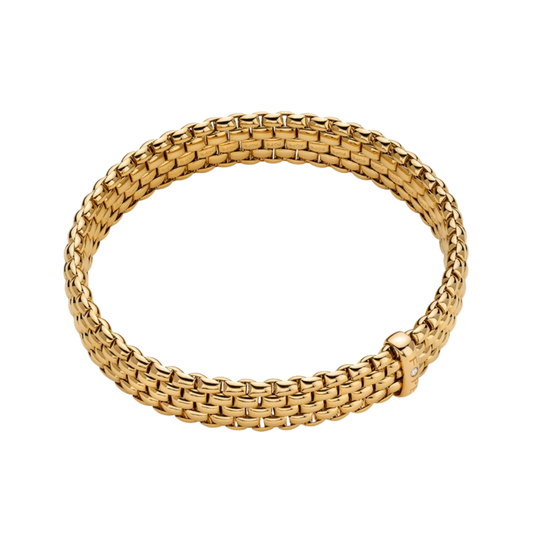 A polished 0.01ct diamond adds a refined finishing touch to this large FOPE Panorama bracelet, designed in flexible 18ct yellow gold for exceptional comfort.