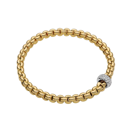 Designed to stretch comfortably over the wrist, this large FOPE Eka bracelet combines warm 18ct yellow gold with a sparkling 0.37ct diamond feature.