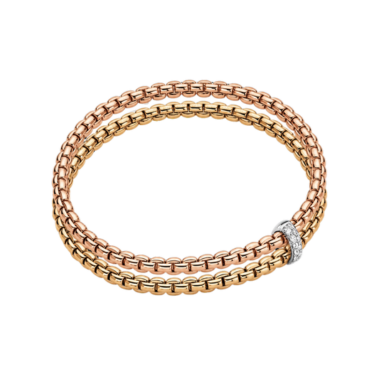 Blending 18ct yellow and rose gold, this medium FOPE Eka bracelet is finished with a polished white gold rondel for an elegant two-tone look.
