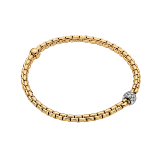 A white gold pavé diamond rondel adds a refined contrast to this small FOPE Eka Tiny bracelet, crafted in flexible 18ct yellow gold for everyday elegance.