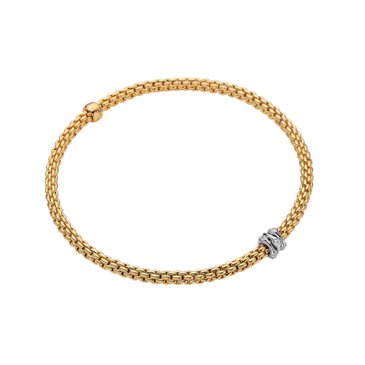 Three diamond-set white gold rondels bring a refined sparkle to this medium FOPE Prima bracelet, beautifully crafted in luxurious 18ct yellow gold.