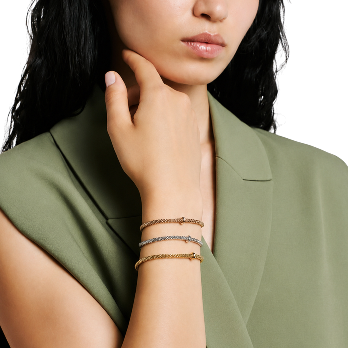 Three different Fope bracelets on model from EKA collection in 18ct gold ad 0.01ct diamond.