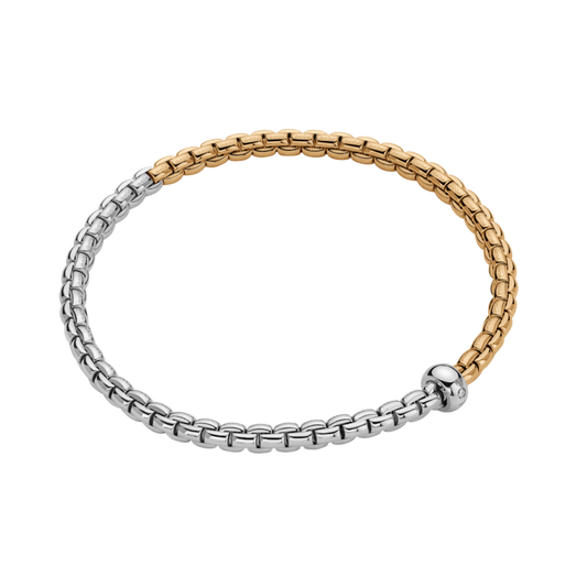A striking combination of 18ct white and yellow gold gives this large FOPE Eka bracelet its distinctive bicolour finish, crafted with the signature Flex'it design.