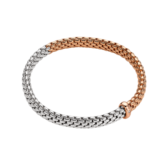 The soft contrast of 18ct white and rose gold gives this small FOPE Vendôme bracelet a refined bicolour finish, complemented by the signature Flex'it design.