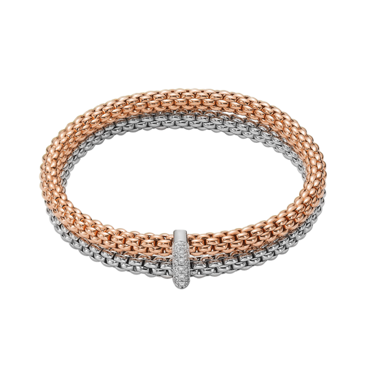 A sparkling 0.10ct diamond-set white gold rondel adds a refined focal point to this medium FOPE Solo bracelet, crafted in a blend of 18ct white and yellow gold.