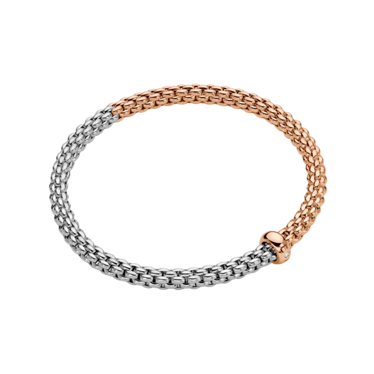 A subtle 0.01ct diamond adds a refined finishing touch to this small FOPE Solo bracelet, crafted in an elegant blend of 18ct white and rose gold.