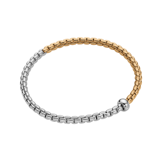 A striking combination of 18ct white and yellow gold gives this large FOPE Eka bracelet its distinctive bicolour finish, crafted with the signature Flex'it design.