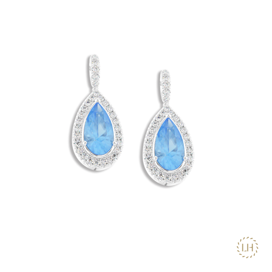 Platinum Pear Cut Aquamarine & Diamond Drop Earrings, featuring 2.08ct of aquamarines surrounded by 0.54ct of sparkling diamonds.