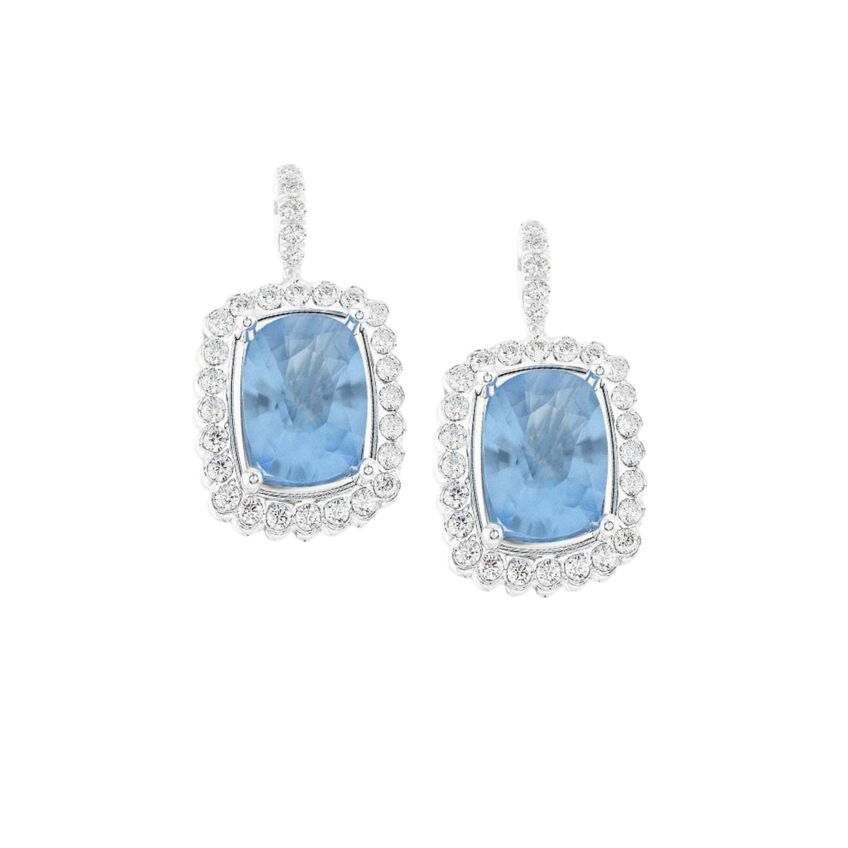 Discover these Platinum Aquamarine & Diamond Drop Earrings, featuring 3.89ct of cushion-cut aquamarines surrounded by 0.55ct of sparkling diamonds.
